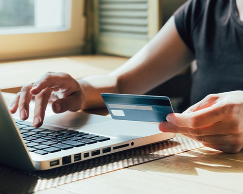 Woman using a credit card